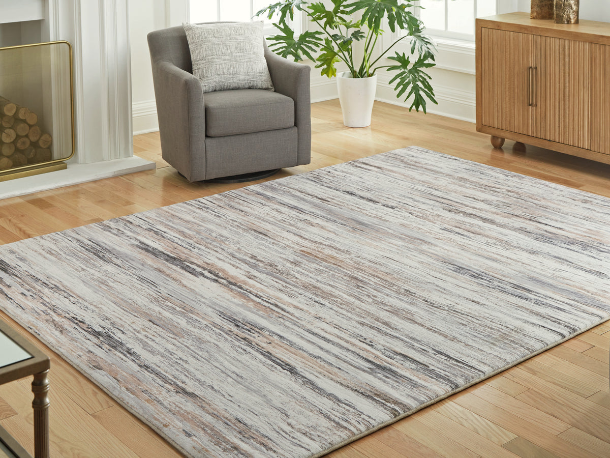 Best Furniture Outlet - Ashley Furniture - Nace Rug - 7'6" x 9'6" Area Rug / Gray/Brown/White - R407471
