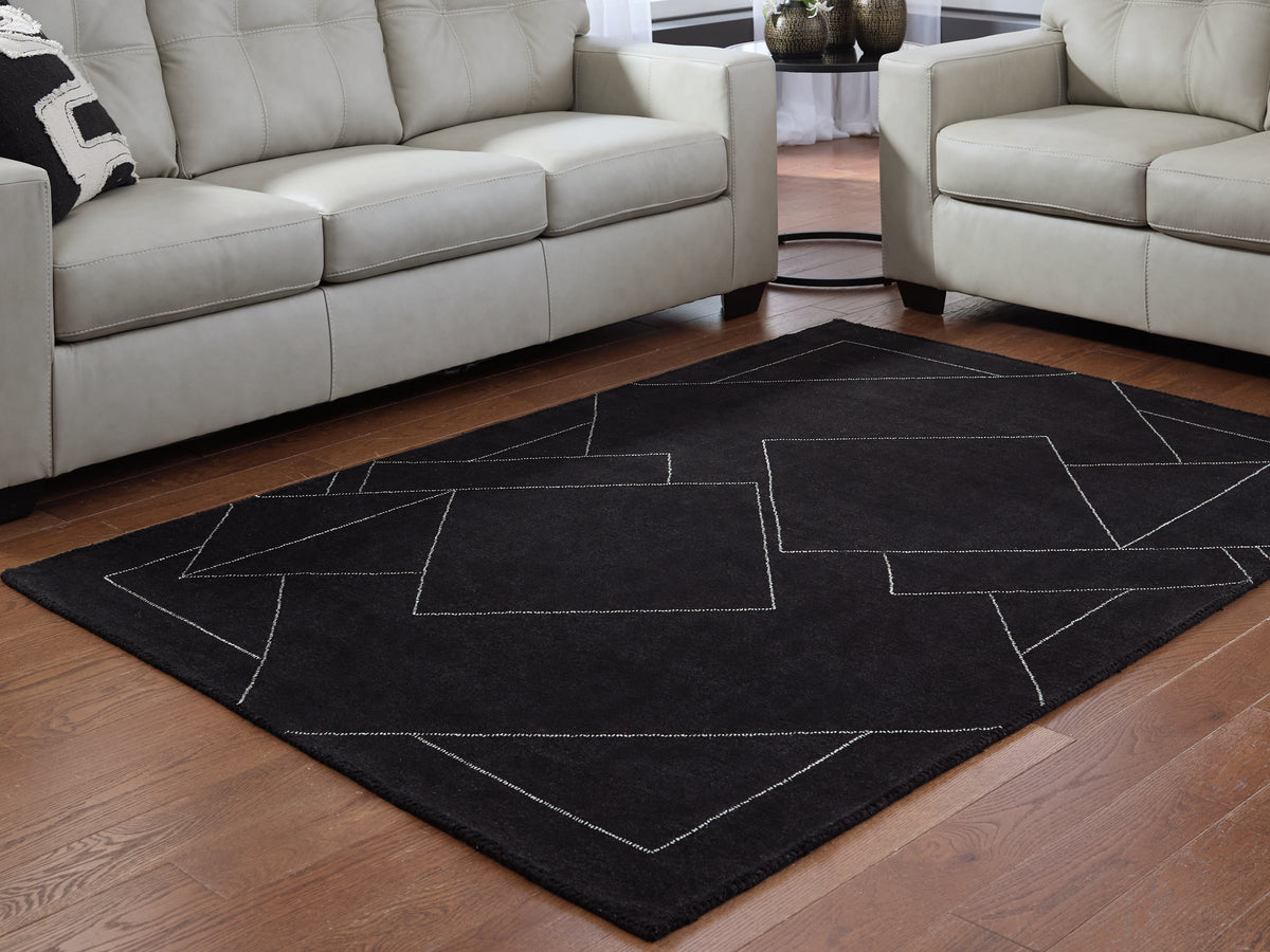 Best Furniture Outlet - Ashley Furniture - Marav Rug - 7'8" x 10' Area Rug / Black/White - R407531